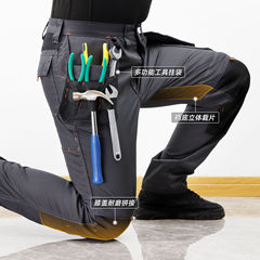 国境を越えた貿易の岩作業服、伸縮性のある男性用耐摩耗性作業ズボン、ゆったりとした屋外用の大きいサイズのズボン、労働保護