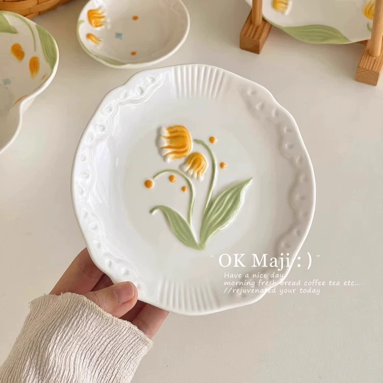 Relief disk home dish dish cute glaze dining plate high -level sensor ceramic shallow plate cake disc