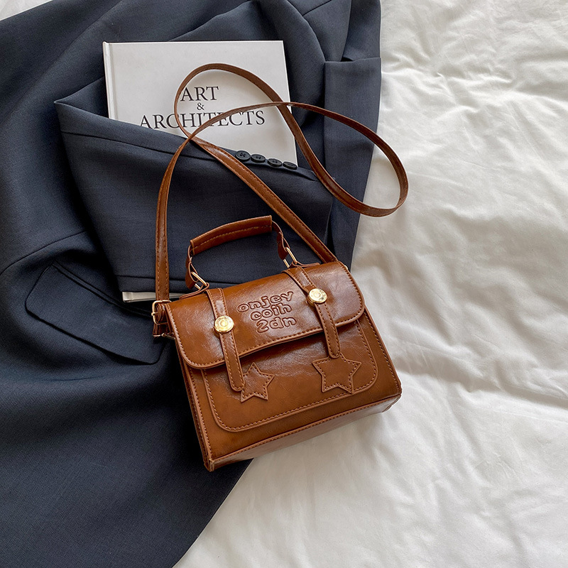 2025 primavera y verano nuevo exquisito pequeño bolso cuadrado moda femenina todo fósforo mensajero de un solo hombro bolso de axila de alta calidad mujer