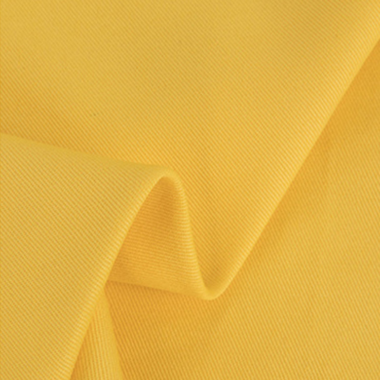 Precio de fábrica de tela de algodón twill tela textil de algodón puro color sólido vestido sostenible tela de algodón