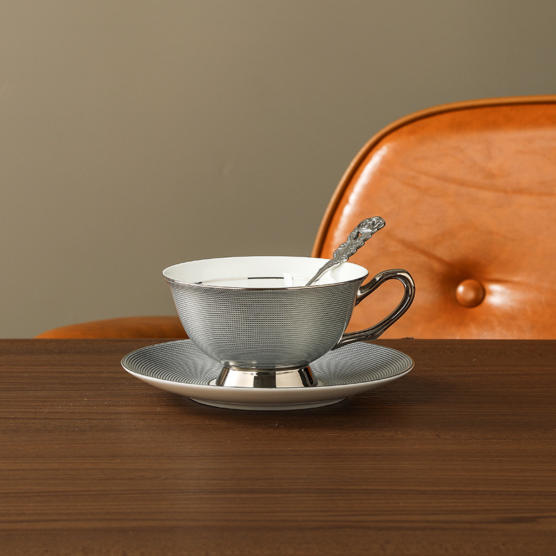 Tazas y platillos de café de porcelana china de alta gama, lujo ligero, té de la tarde de alto valor, tazas de pareja, cajas de regalo exquisitas, tazas de cerámica de lujo