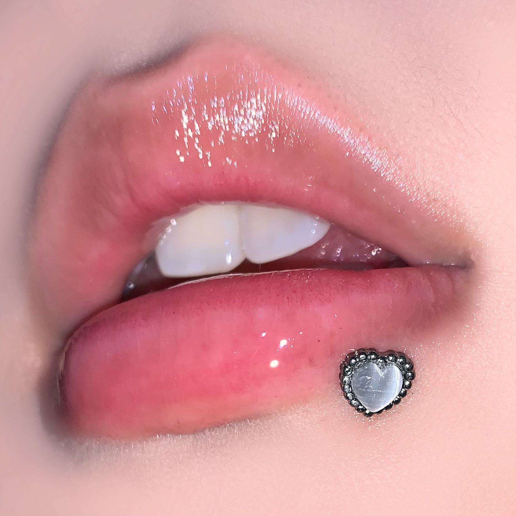 Silver pointed spike labret stud material detail