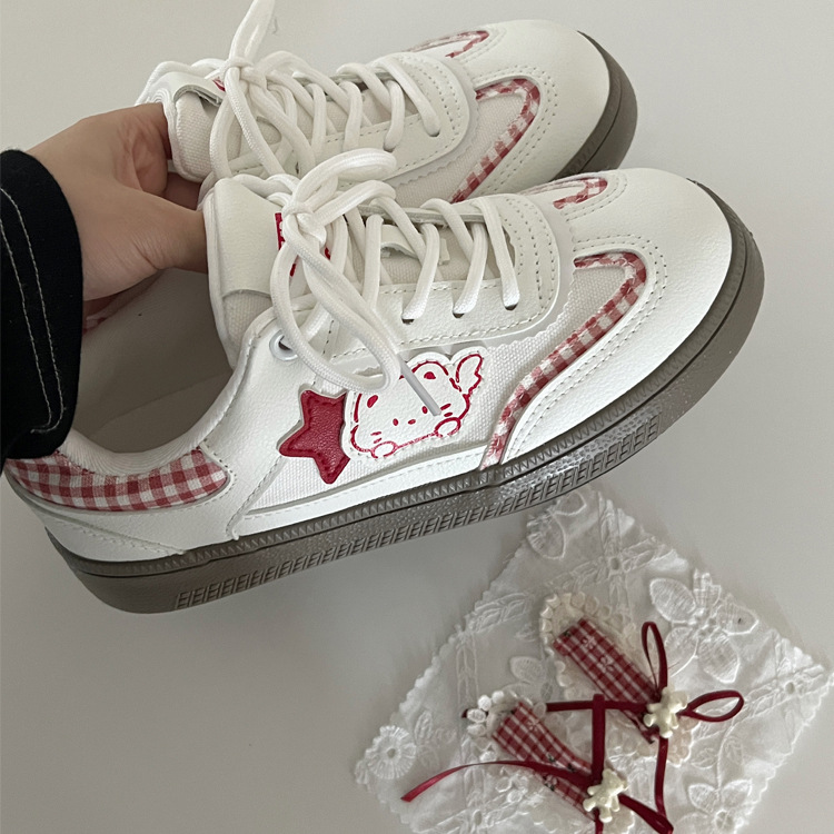 Zapatos de skate de arco para mujeres otoño de 2025 nuevos zapatos blancos transpirables de nicho para mujeres coreanas zapatos de entrenamiento moral para mujeres