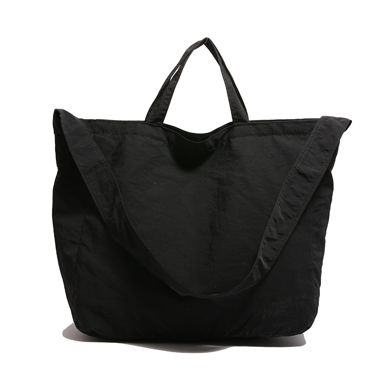 Simple relajado sensación de gran capacidad bolso de lona de hombro de mujer hollow viento versátil bolso de mochila