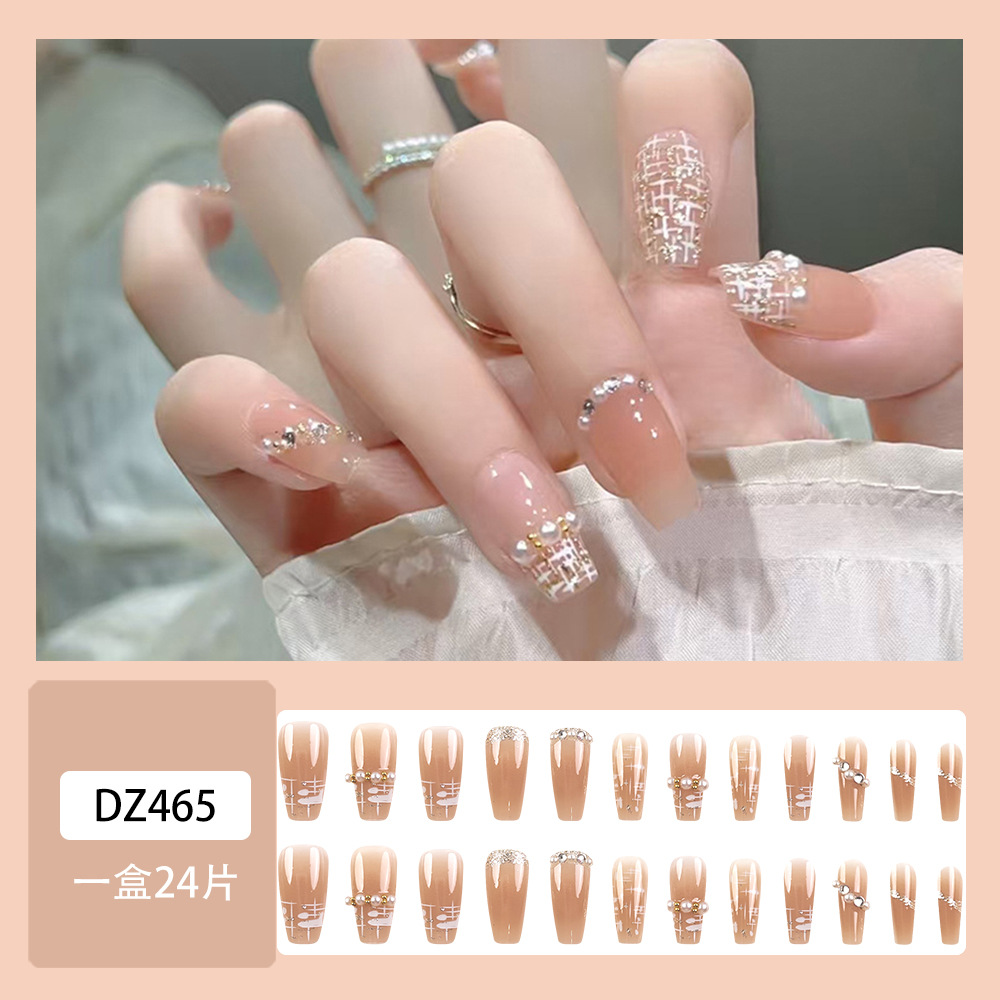 Ventas domésticas cortas de perforación de punto de fábrica de uñas al por mayor para diseñar parches de manicura falsas desmontables