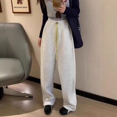 韓国版の純色のベルベットのストレートのひもの衛のズボンの女性の冬の新型の百合はゆったりしていてやせているレジャーのズボンのズボンを現します。
