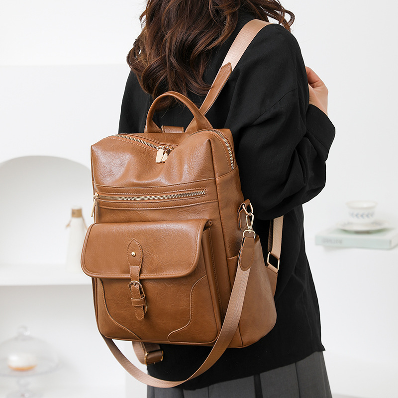 2025 nueva mochila de cuero suave para mujer retro europea y americana, mochila multifuncional de gran capacidad de moda