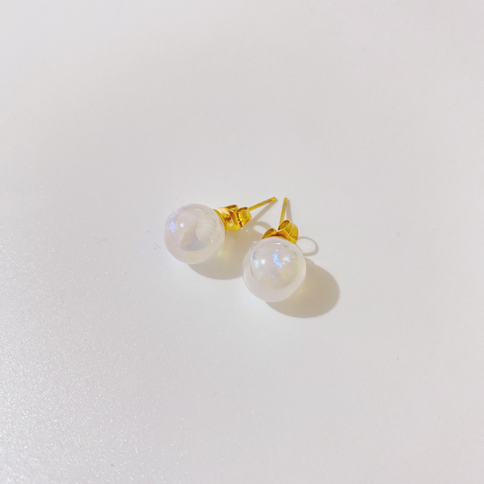 Fashion Transparent Fine Flashing Colorful Pearl Titanium Steel Earrings display picture 3