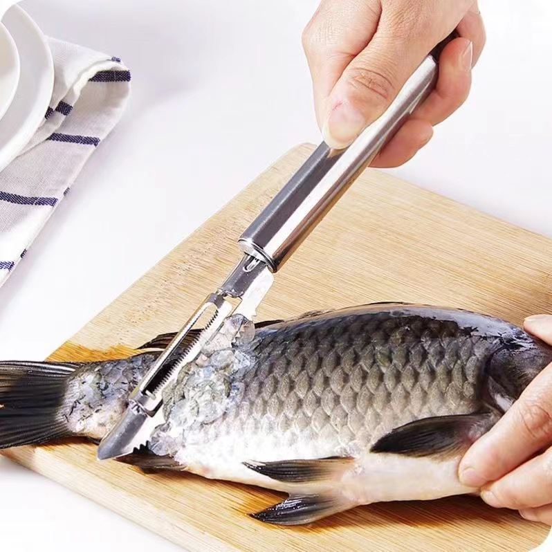 Los fabricantes suministran cepilladora de acero inoxidable, cepillado de escamas de pescado, pelador de frutas, pelador, cepillador de frutas y melón doméstico de cocina