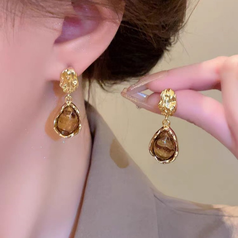 Fashionable elegant earrings drop-shaped