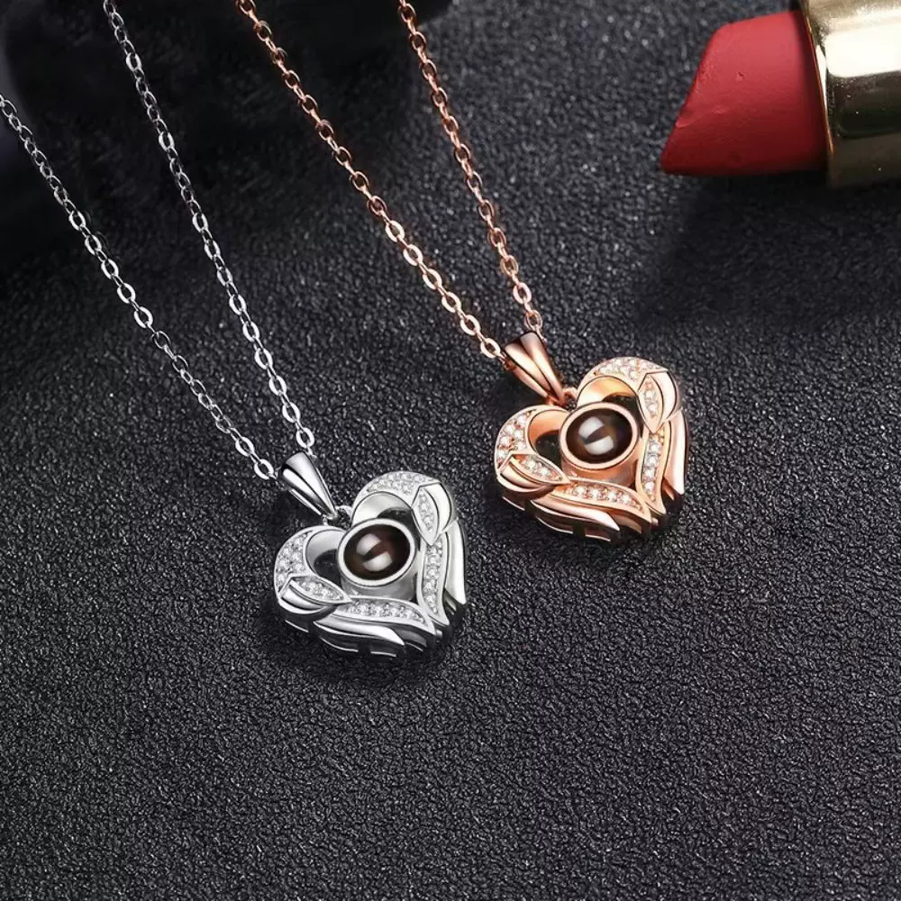 亚马逊外贸饰品100种语言我爱你项链爱心翅膀小众设计感吊坠