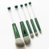 Dark green brush handle
