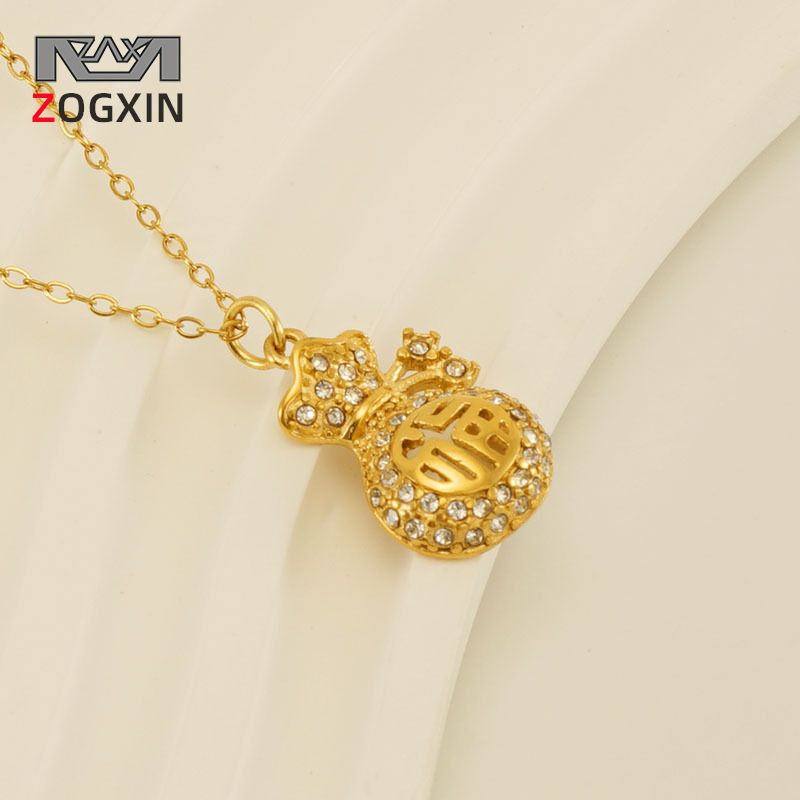 Amazon nuevo estilo Chapado en acero inoxidable 18K oro diseño Lucky bag collar femenino de titanio con incrustaciones de acero rhinestone colgante hueco femenino