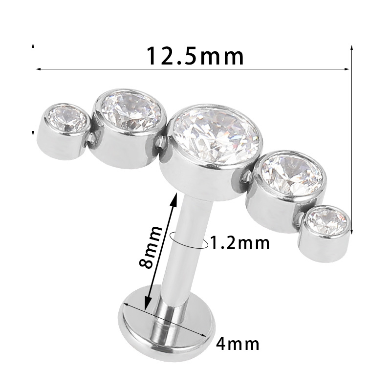 Silver pointed spike labret stud material detail