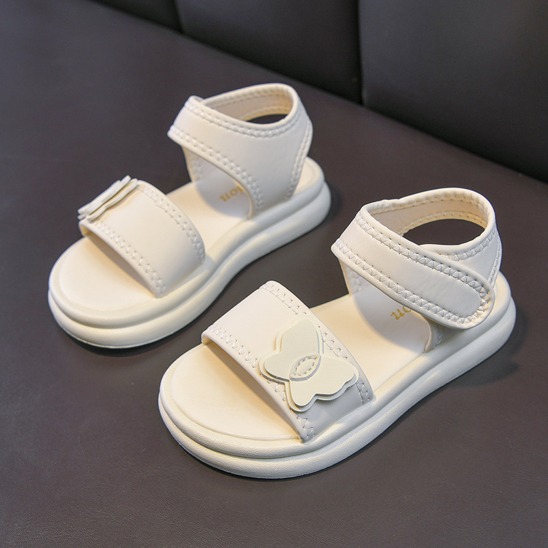 Zapatos casuales de moda de niñas versátiles 2026 verano nuevos niños sandalias de dedos abiertos huecos zapatos de princesa mariposa