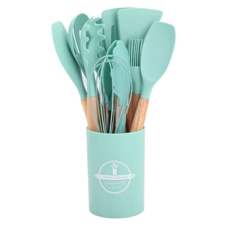 Comercio exterior venta caliente set de cocina de silicona 12 piezas set de silicona antiadherente set de barril de almacenamiento giratorio