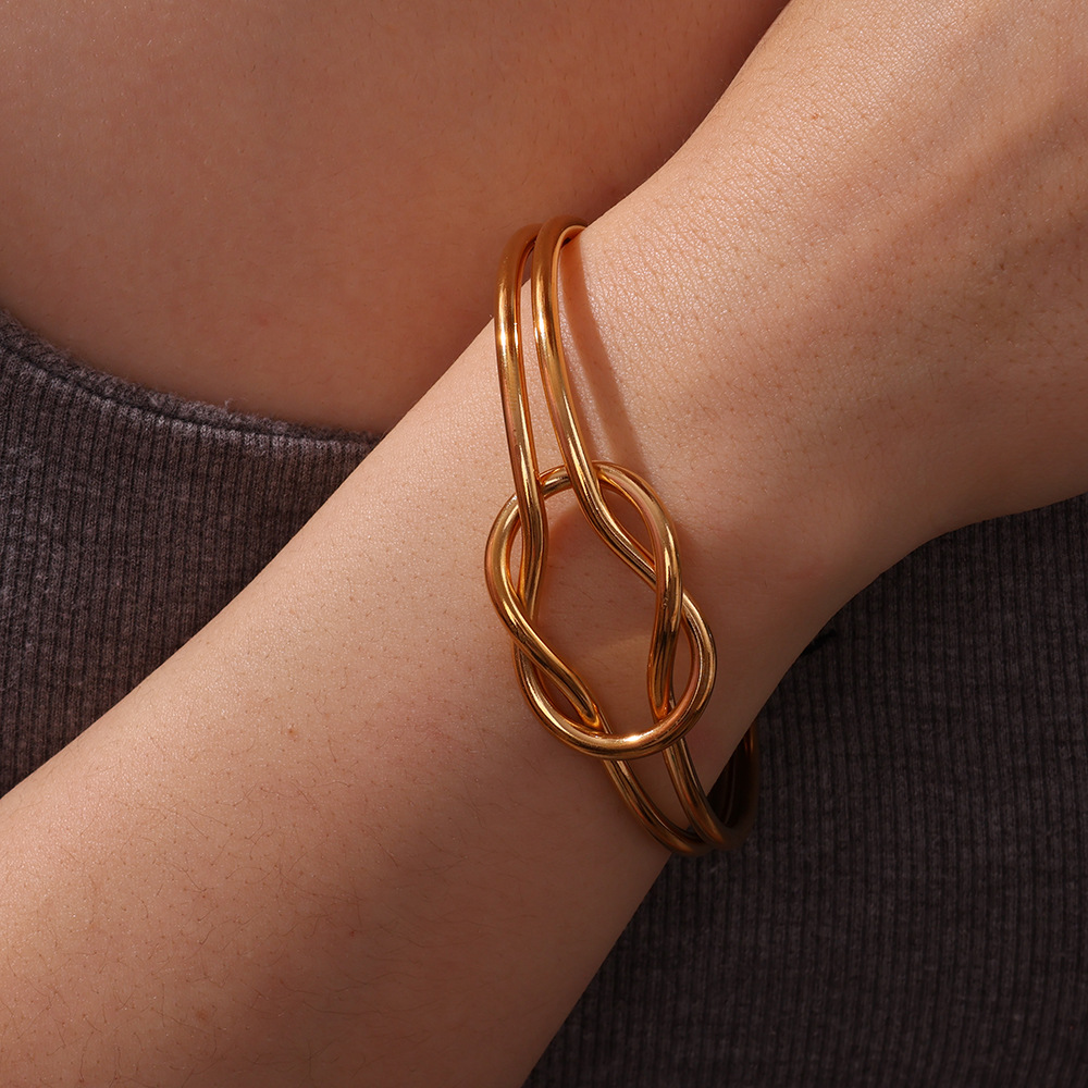 Brazalete de acero inoxidable transfronterizo de 18K personalidad exagerada simple anudado abierto pulsera de acero inoxidable INS todo fósforo venta caliente