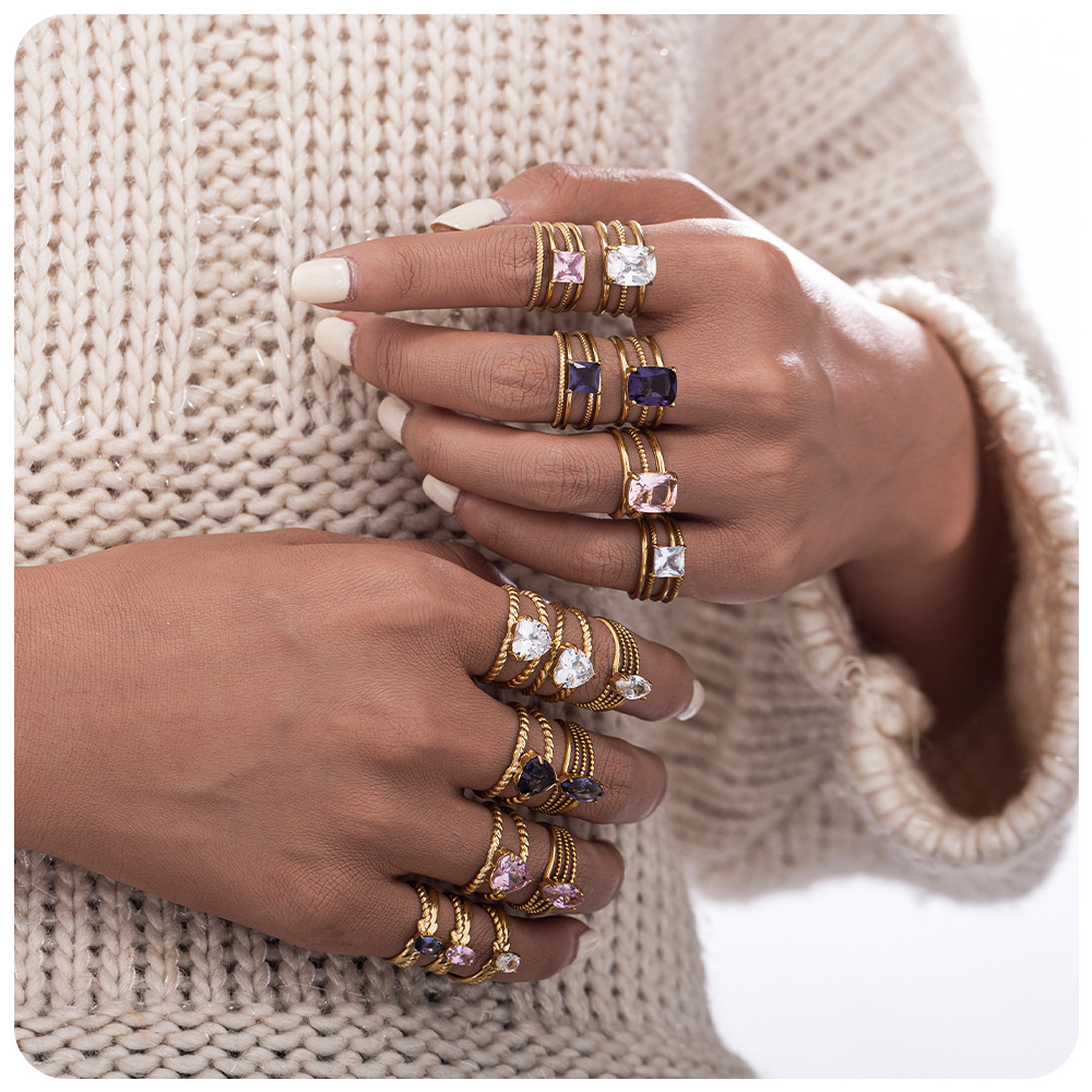 TENA oro de 18 quilates de color zirconos viento de alta calidad anillo de lujo ligero de moda joyas de acero inoxidable