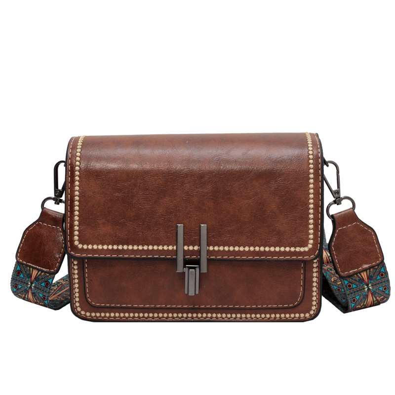 Popular retro textura bolso cuadrado para mujeres 2025 nuevo estilo simple de moda bolso de hombro correa ancha mochila casual