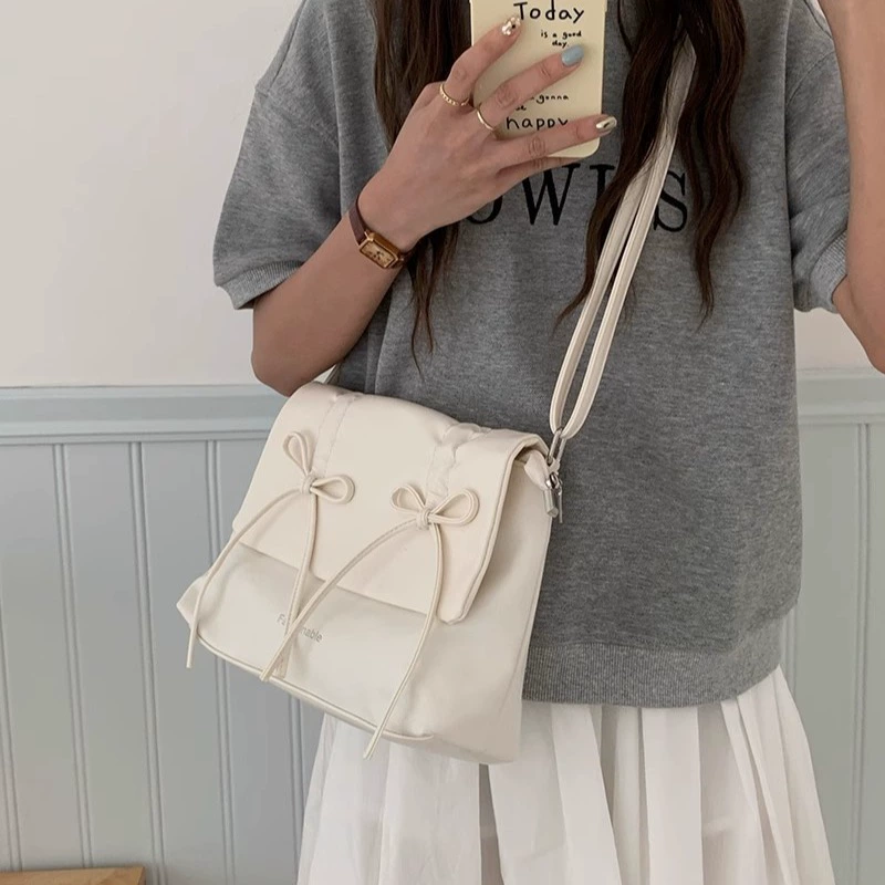 Cute fuchsia shoulder bag with bow, capacious one-shoulder bag