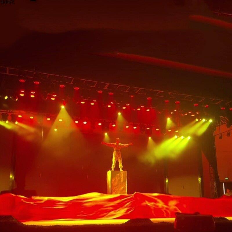 Large-scale dance performance with red ribbons and colorful streamers, featuring red silk cloth, Yangko dance props, and double-flying props.