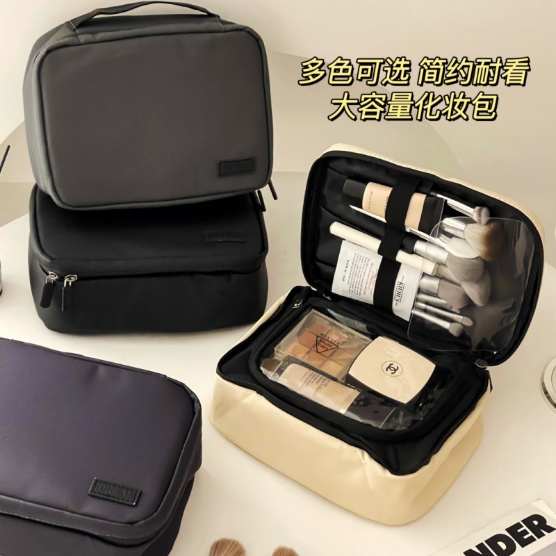 2024 nueva bolsa de cosméticos pu simple moda partición impermeable bolsa de almacenamiento de cosméticos bolso al por mayor de la fábrica