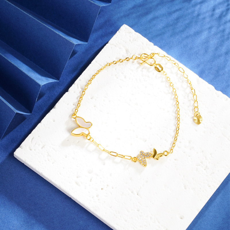 2024 nuevos productos lujosos pulseras mariposa de frita coreana simple vietnamita color de oro de arena micro-incrustado nicho de diseño suministro