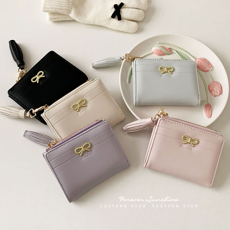 Ins exquisite bow wallet women's simple Korean version of short ladies wallet wholesale wallet tassel pendant in stock
