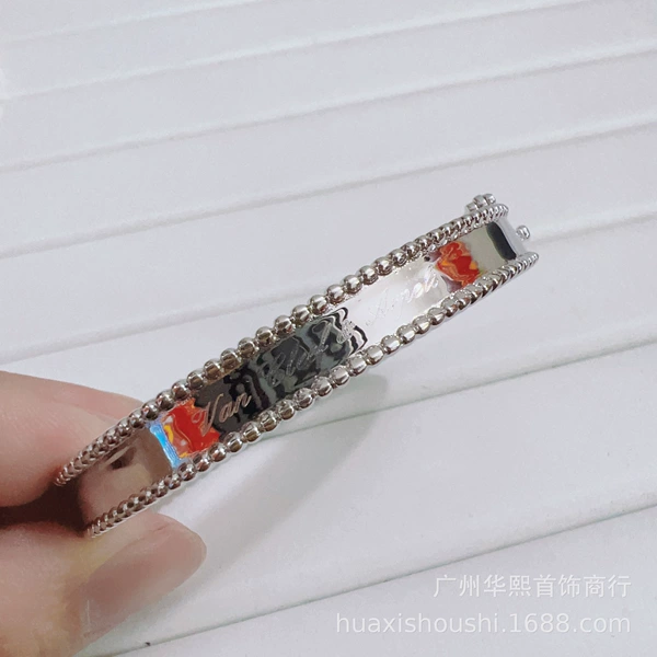 Silver white bracelet, English