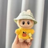 Green bunny hat + small yellow duck sweater + yellow kettle