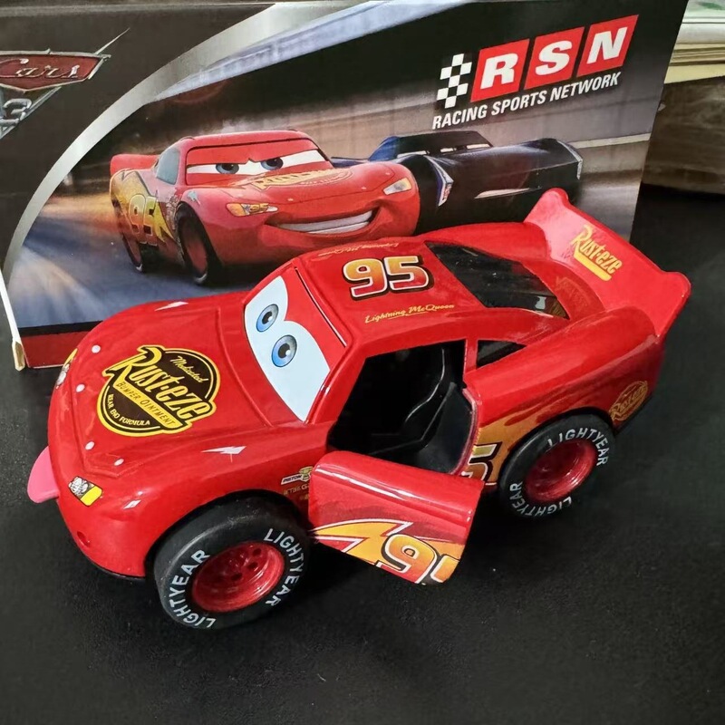 Cross-border Cars series alloy car model Lightning McQueen with tongue sticking out, featuring pull-back and sound and light functions, 1/32 scale model ornament Cross-border Cars series alloy car model Lightning McQueen with tongue sticking out, featuring pull-back and sound and light functions, 1/32 scale model ornament