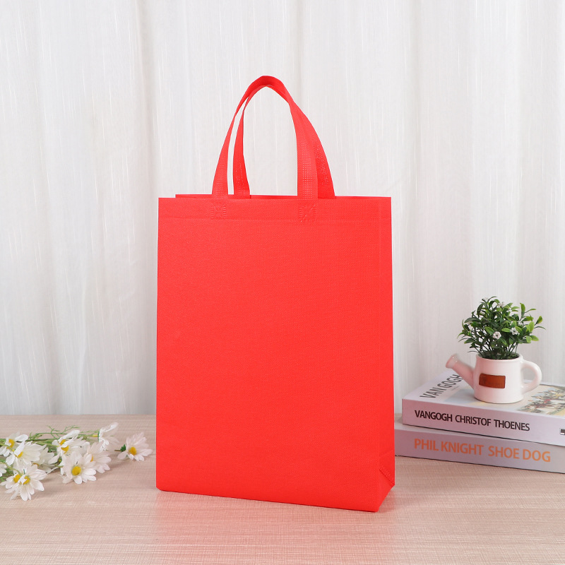 Bolsa de mano no tejida de color vertical en stock para aumentar el embalaje de regalo en blanco imprimible logotipo bolsas no tejidas