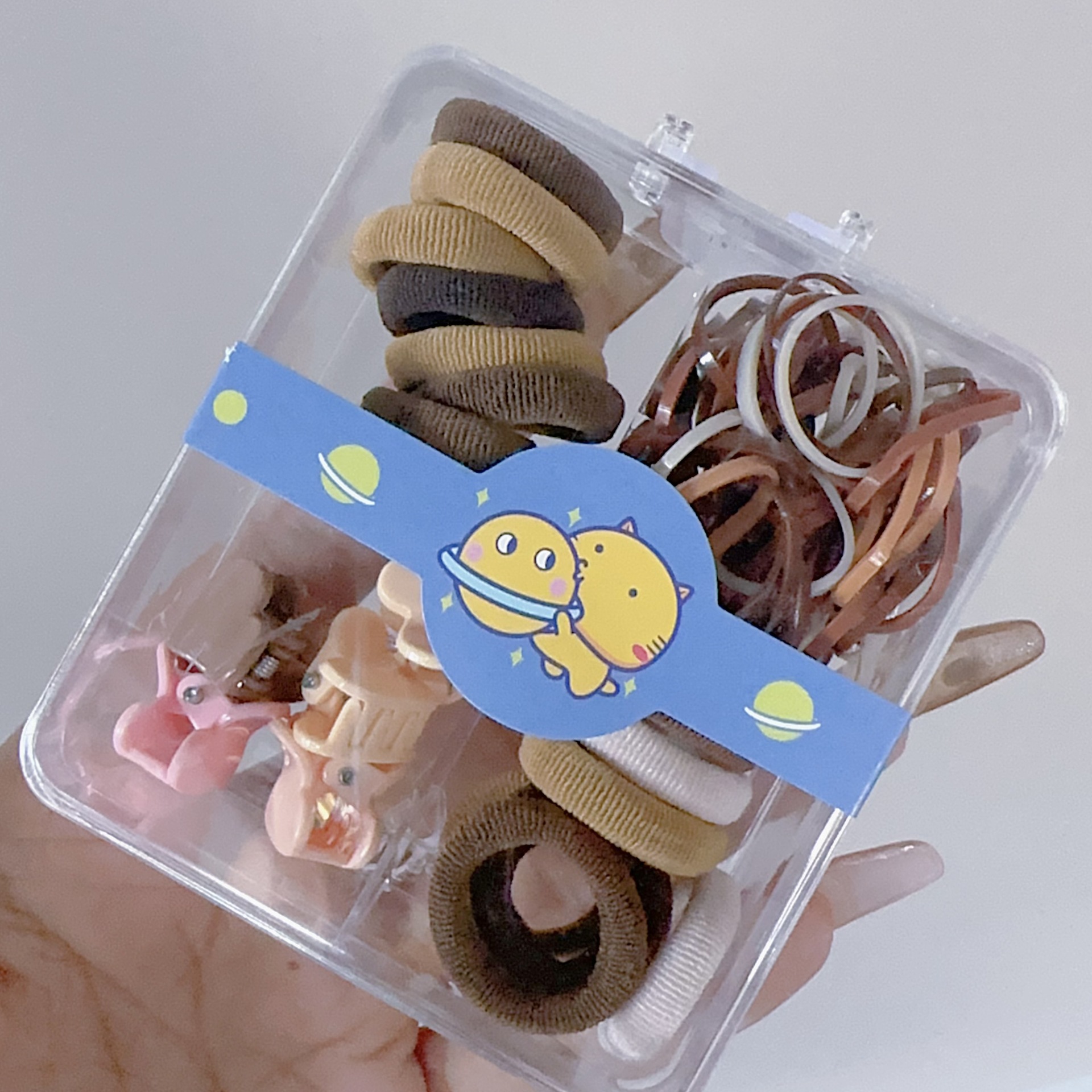 Al por mayor 2.5 pulgadas pulgar pequeño anillo de cabello nuevo niño no lesiones de cabello correa de color caja de chaqueta de cabello pequeña personalidad encantadora