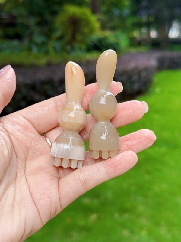 牛の角の小さい蓮の蓬の一体の多珠の目の部のマッサージのかわいい形の目の部の看護は筋の点穴を動かして水腫の目尻に行きます。|undefined