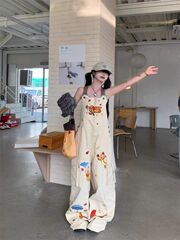 アメリカのレトロな漫画の刺繍のデニムの背もたれのズボンの女性の夏の高い街のデザイン感はゆったりとしています。