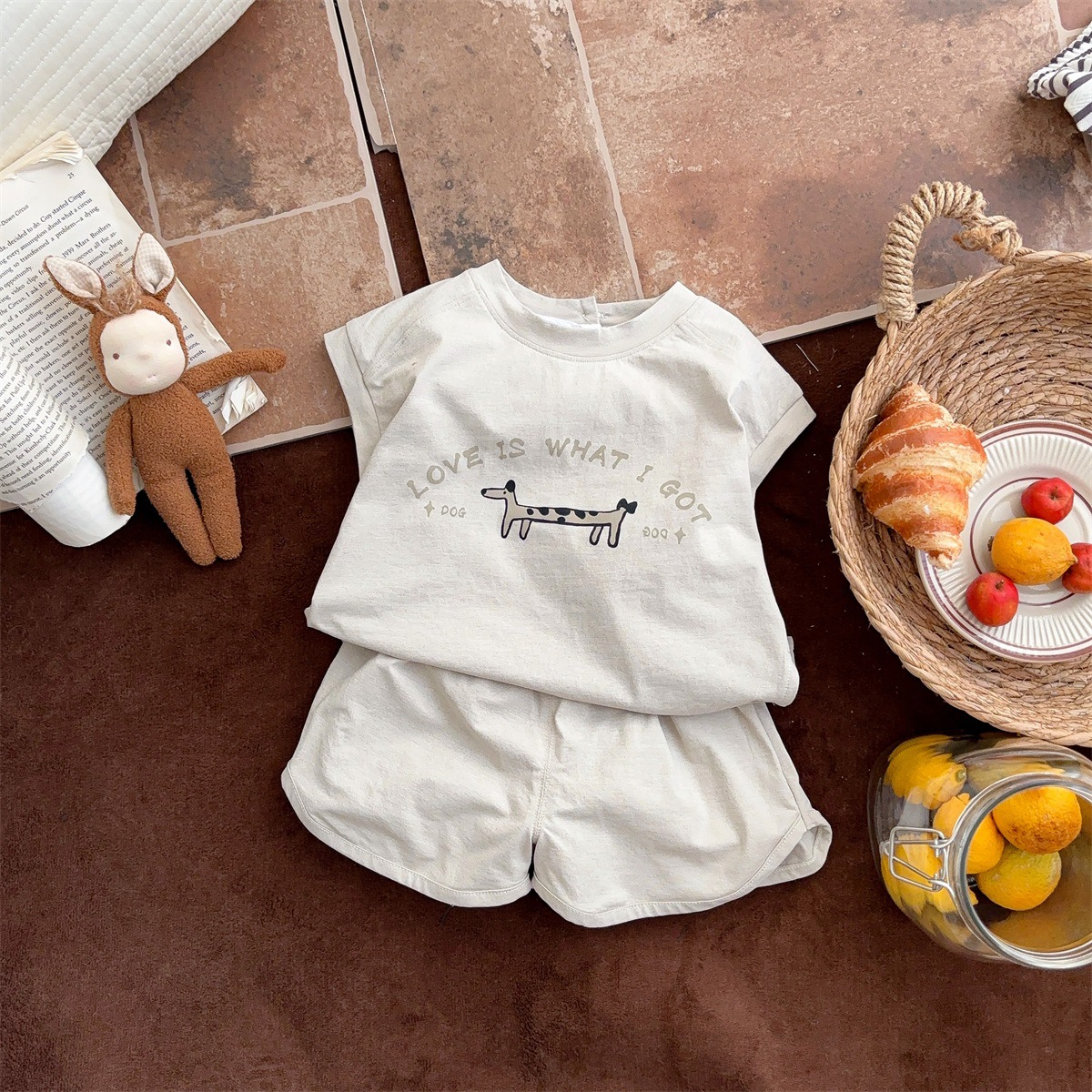 Baby Puppy Print Versión coreana sin mangas de verano recién nacido Pantalones cortos de estilo occidental Baby A Thin Summer Traje de dos piezas