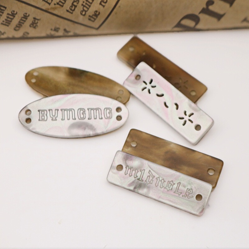2025 New Products in Stock: Imitation Shell Resin Letter Signs, Oval Long Tags, High-End Versatile Decorative Buttons