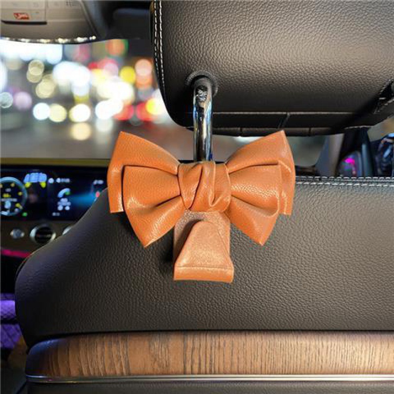 Garganto de automóvil Garganto de respaldo de silla Red cuero lindo arco multifuncional coche pequeño gancho de plástico