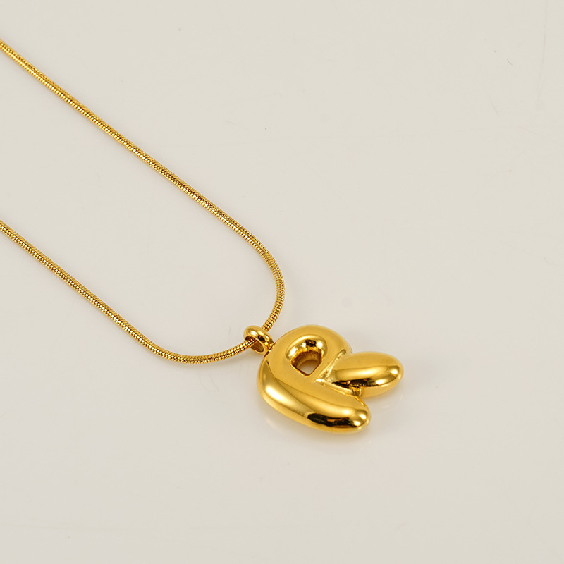 Burbujas transfronterizas 26 letras inglesas colgante brillante collar nicho universal oro acero titanio joyería collar
