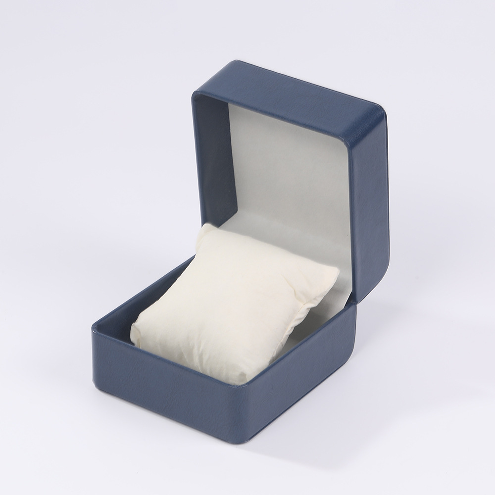 Nueva caja de exhibición de reloj con patrón de lichi con tapa abatible de alta gama, caja de embalaje de reloj de almohada de regalo de vacaciones, caja de almacenamiento al por mayor