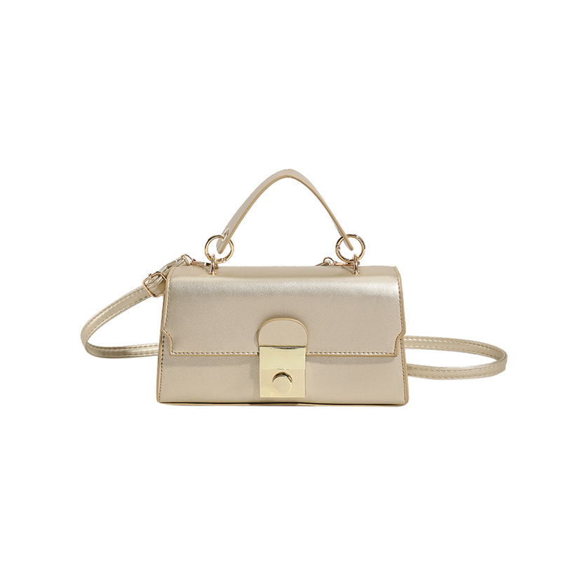 2025 primavera nuevo temperamento diseño de moda estilo extranjero textura simple mochila de hombro bolso de bloqueo de mano color caramelo