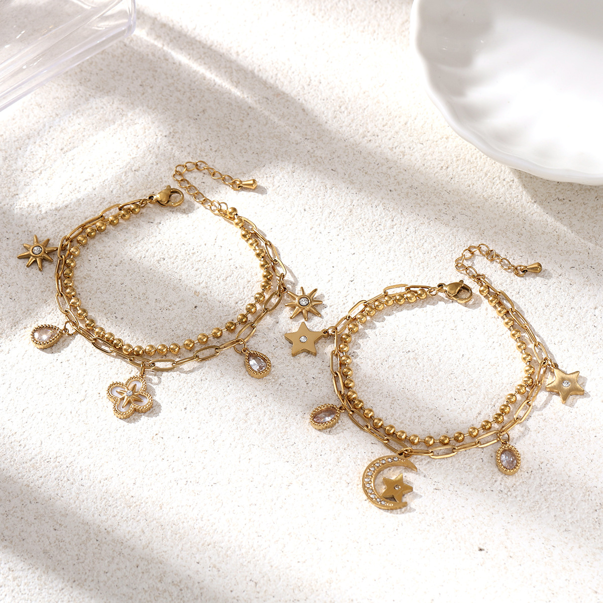Tina Europa y América pulsera de acero inoxidable lujo ligero nicho universal personalidad tendencia flores más colgantes pulsera de piedra caliente