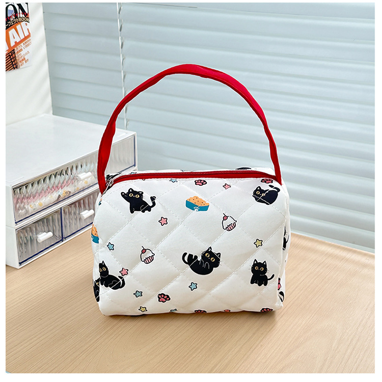Japanese-style cartoon cat makeup bag with high appearance standards, a three-dimensional large-capacity travel storage bag for girls to wash up when going out, a trendy hand undefined
