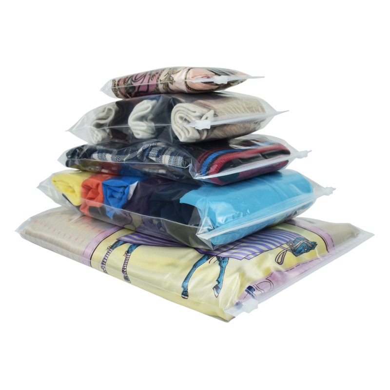 Venta al por mayor en stock transparente PE bolsa de embalaje PE ropa bolsa de embalaje ropa cremallera ziplock bolsa