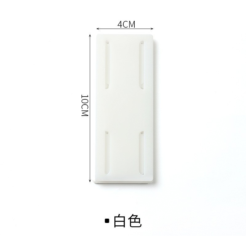 コンセント固定器の壁に壁掛を貼って収納します。|undefined