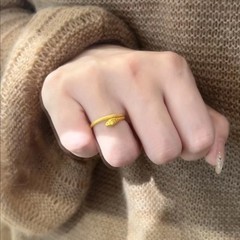新しい小型の霊蛇の指輪の女性の大衆の設計のファッションの百合の気質の軽い豪華な高級感の本命の年の肖蛇