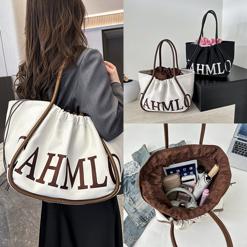 泰国时尚个性单肩女包2025春夏新款鹿皮绒腋下包百搭通勤手提包女