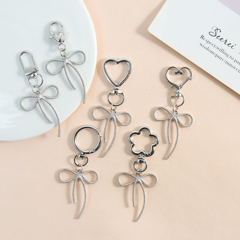 New Zinc Alloy Sweet Cool Hollow Bow Key Pendant Pendant Necklace Bracelet Earrings Accessories Material Wholesale