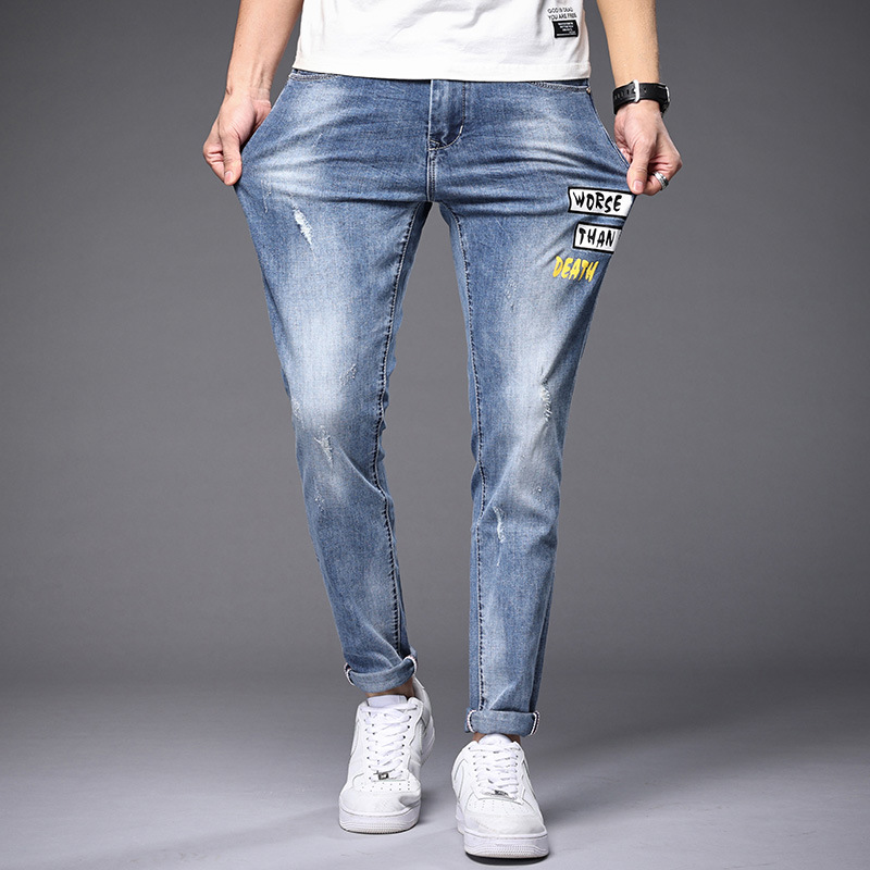 青年潮流印花男装牛仔裤春夏磨白浅色长裤子个性小脚裤男士修身款