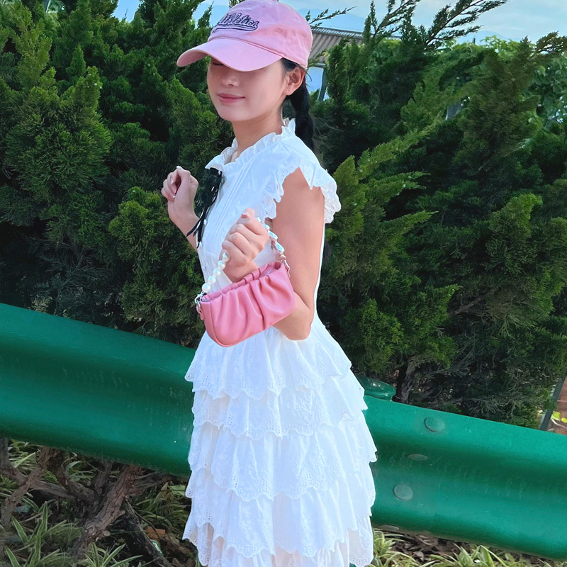 Nuevo bolso para niños, bolso de niña perla de amor fresco y dulce, mini bolso de mensajero para bebé plisado de estilo occidental